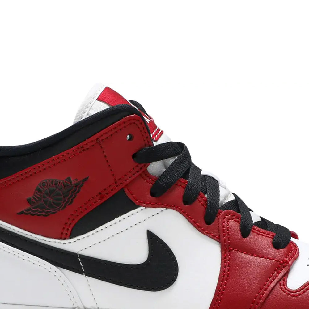 Air-Jordan-1-Mid-‘Chicago-White-Heel’-GS-side-close-up